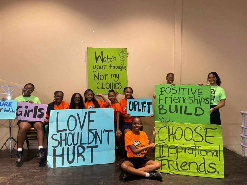 Some of the campaign participants from Bishop Anstey High School with their placards. Photo courtesy Caribbean Gender Alliance. - 