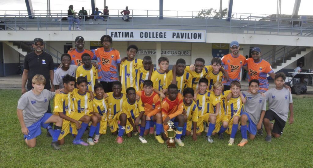 Fatima under-13 boys football team with their principal Ronald Cooper and head coach Damien Frederick. - Ronald Daniel 