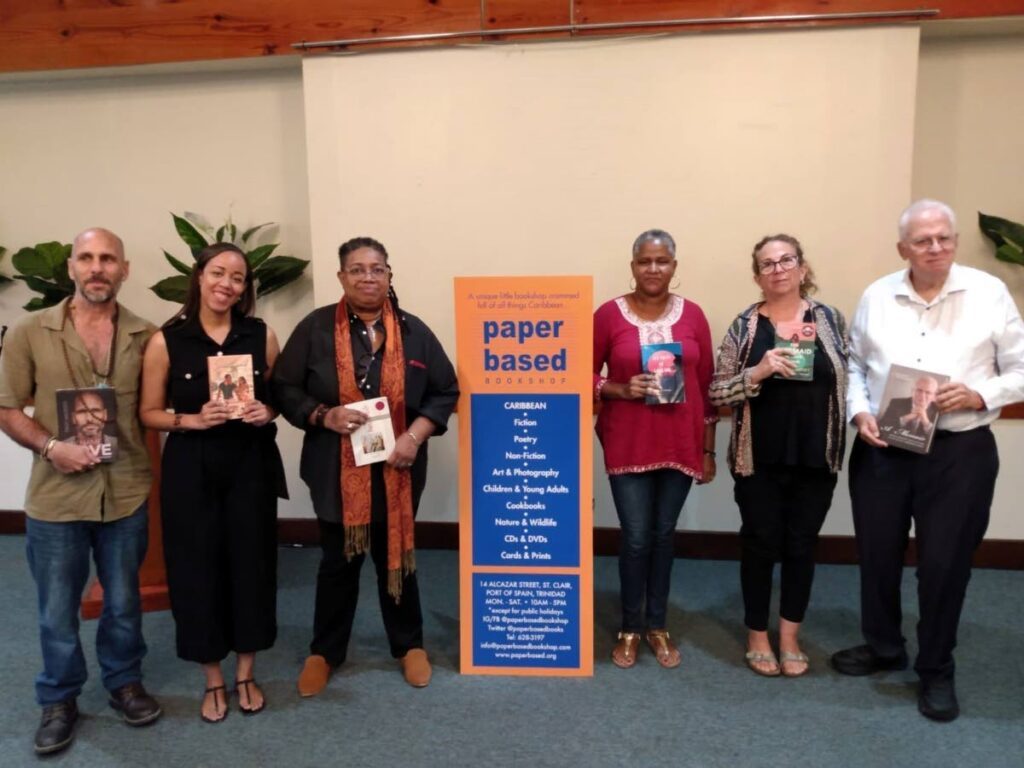 Authors Troy Hadeed, left, NG Peltier, Paula Obé, Ruth Osman, Monique Roffey and Ronald Harford with their books at An Evening of Tea and Readings. Photo courtesy Denicia Baptiste - 