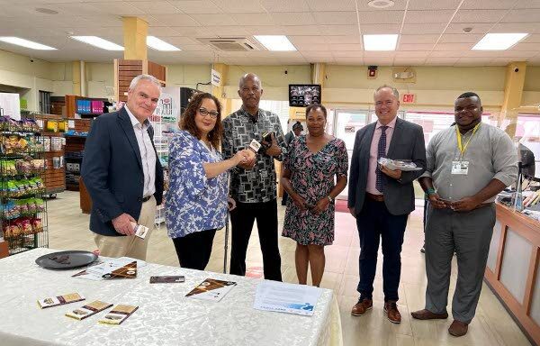 UWI Cave Hill Campus principal, Prof Clive Landis, left; Pro vice-chancellor and St Augustine Campus principal, Prof Rose-Marie Belle Antoine; UWI vice-chancellor, Prof Sir Hilary Beckles; The UWI Bookshop manager, Beverly Smith-Hinkson; Barbados Chamber of Commerce and Industry (BCCI) president James Clarke and UWI-Souzhou assistant registrar at the China Institute of Information Technology Justin Seale. - 