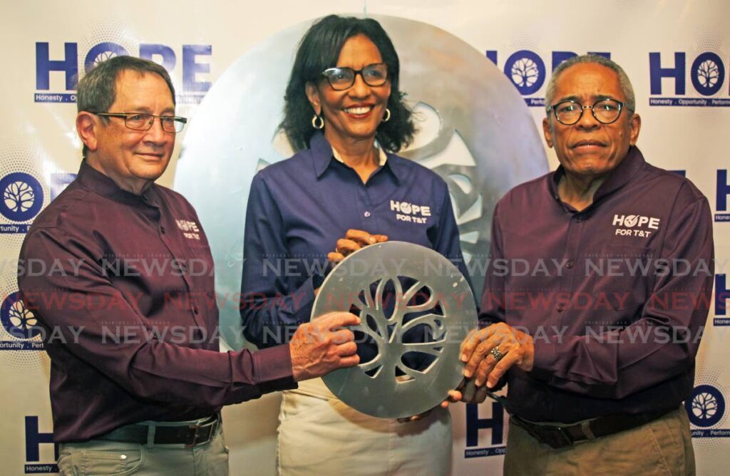From left, political leader of HOPE Timothy Hamel-Smith, deputy political leader, finance, Karen Nunez-Tesheira and deputy political leader, governance, Louis Lee Sing at the launch of their party at Paria Suites, La Romaine on Saturday. - LINCOLN HOLDER