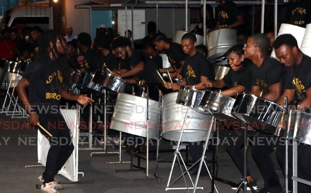 Members of St Margaret's Super Stars play in the National Panorama preliminaries for small conventional steelbands at their panyard in Belmont on Monday. - Photo by Angelo Marcelle