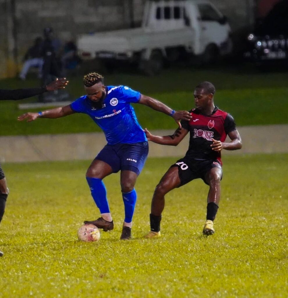 Police FC's Khaleem Hyland controls the ball during the TT Premier Football League match against 1976 Phoenix FC, on Monday night, at the Police Barracks, St James.  - TT Premier Football League