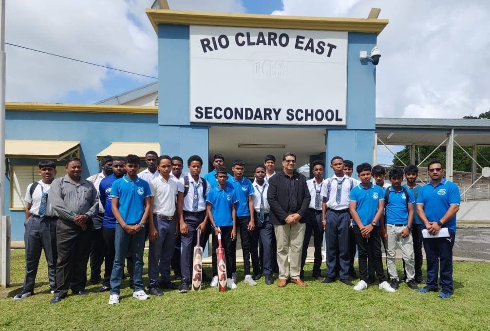 Mayaro MP Rushton Paray donates cricket equipment to Rio Claro East Secondary School. - 
