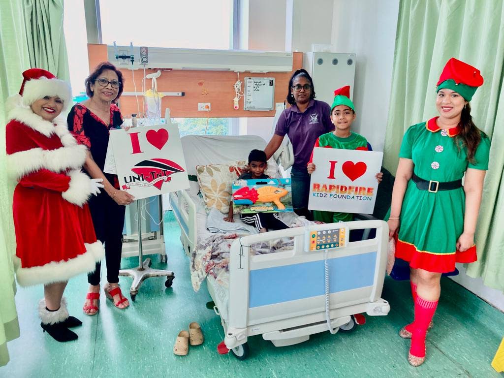 Mrs Claus and her helpers visited the children at the paediatric wards at the San Fernando General Hospital. - Photo courtesy Rapidfire Kidz Foundation