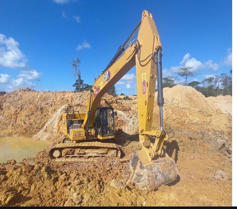 One of the excavators seized by police during a raid on an illegal quarrying site in Sangre Grande on December 2.  - Photo courtesy TTPS