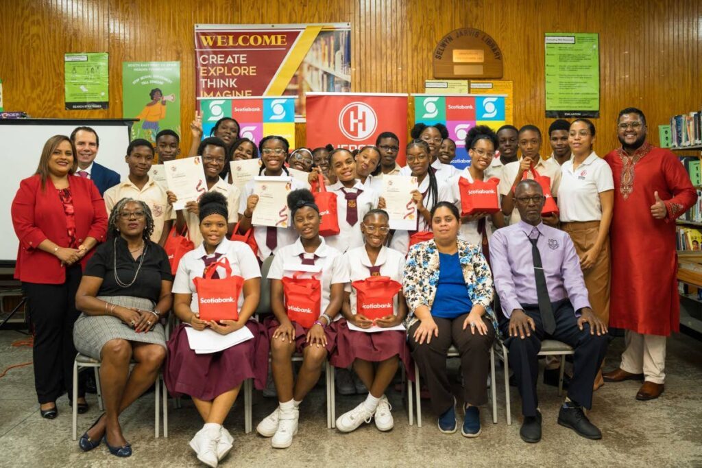 Participants in the Heroes Development Programme at the South East Port of Spain Secondary School with team members from the Heroes Foundation and Scotiabank Foundation. - 