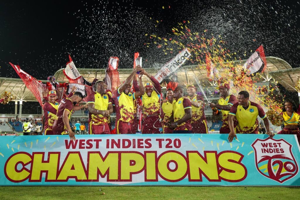 West Indies players celebrate their 3-2 Twenty20 series win over England at the Brian Lara Cricket Academy, on Thursday, in Tarouba. West Indies beat England by four wickets in the fifth and final match.  - Daniel Prentice