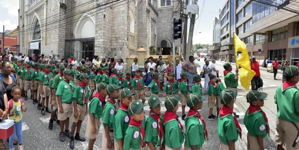 Members of the Fourth Port of Spain Cub Pack durubg Corpus Christi celebrations earlier this year. - Photos courtesy Scout Association