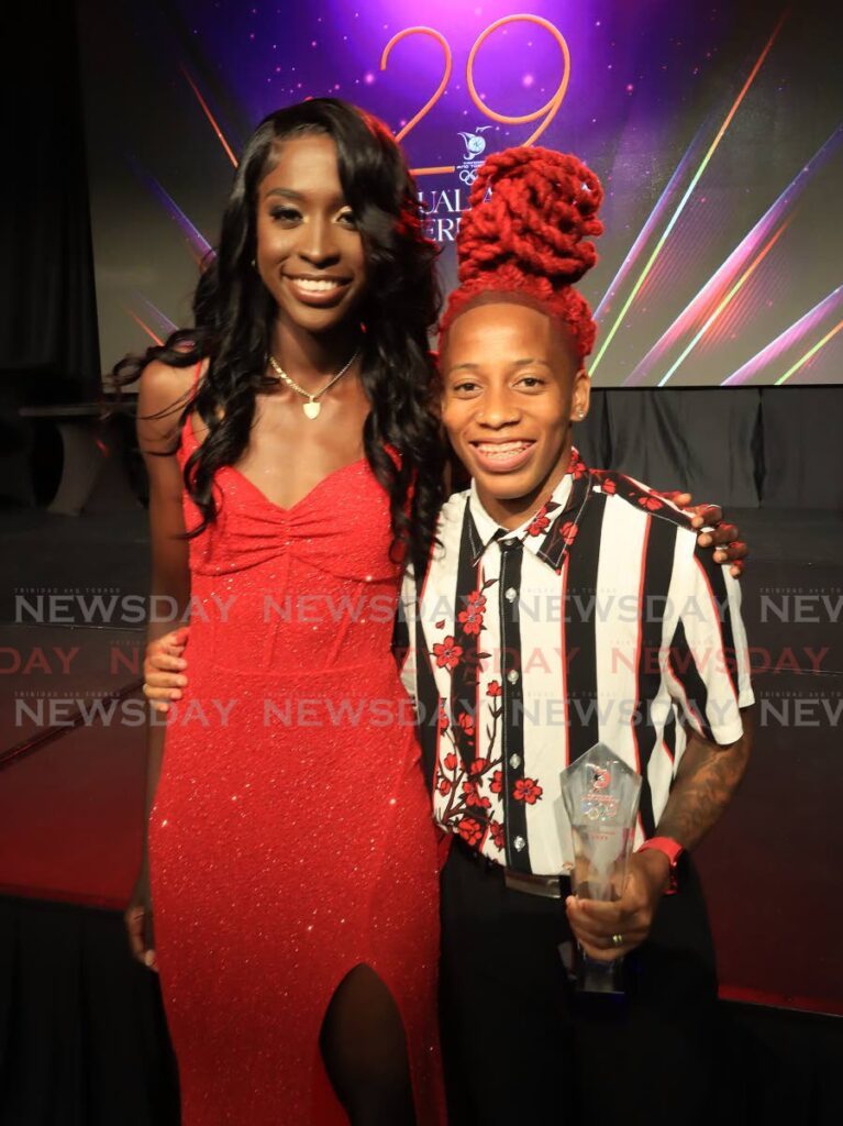 Cyclist Teniel Campbell (L) stands alongside the TT Olympic Committee’s (TTOC) Sportswoman of the Year 2023 sprinter Michelle-Lee Ahye at the TTOC awards ceremony, on Friday, at the Hyatt Regency, Port of Spain. - ROGER JACOB