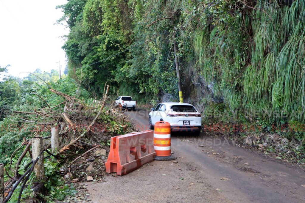 A landslide occured on a section of the North Coast Road, about 1km before the look-out on Saturday night. The affected area has been temporarily turned into a one lane, making Maracas Bay still accessible to the public. - Photo by Angelo Marcelle