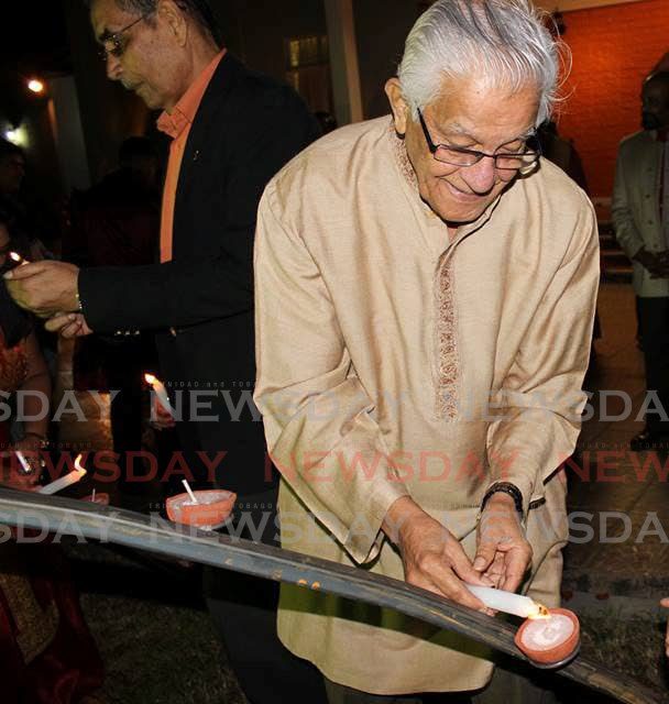 In this file photo, former prime minister the late Basdeo Panday lights a deya at the Indian High Commissioner Divali celebrations in 2017. - 