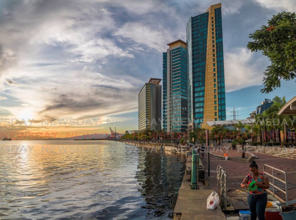 People fishing at the International Waterfront on Wrightson Road, Port of Spain in 2022.  - FILE PHOTO 