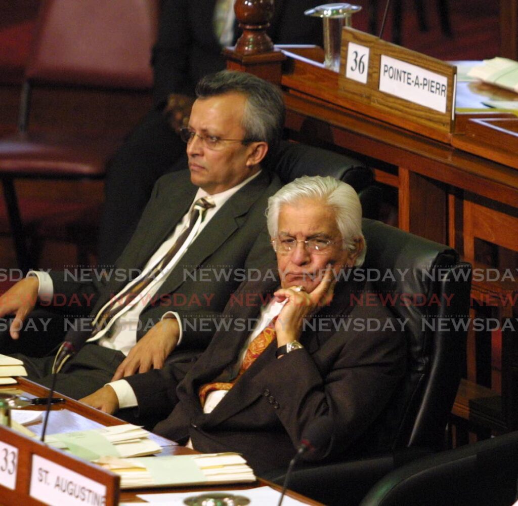 Former UNC MP Ganga Singh, left, and opposition leader Basdeo Panday in Parliament in 2004.  - 
