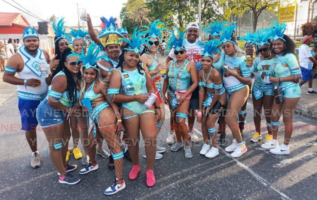 In this file photo, masqueraders play with Arkadians on Carnival Monday, February 21, 2023 in Arima. Arima launches its Carnival programme, Mas in We DNA, on January 19 - 