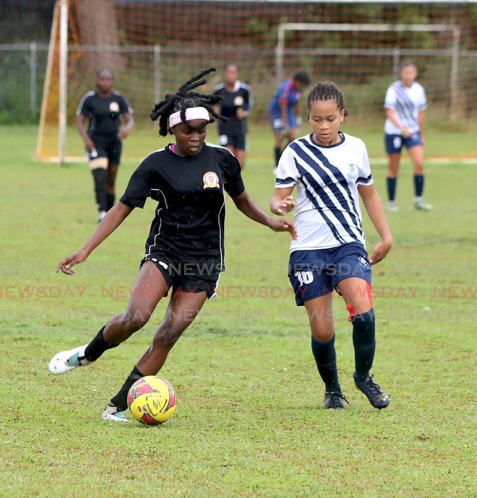In this November 2, 2023 file photo St Joseph's Convent Port of Spain's Charlotte Hadeed, right, vies for possession with Pleasantville Secondary's Jada Shepherd, left, during the SSFL's Girls' Big Five match, at the St Joseph Convent schools grounds, Port of Spain.  - Photo by Roger Jacob