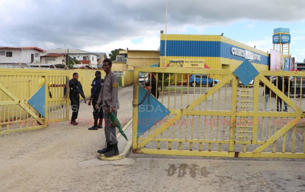 Courts Megastore, Churchill Roosevelt Highway, Barataria, after two people were killed and three others injured in a police-involved shooting on Sunday. - Angelo Marcelle