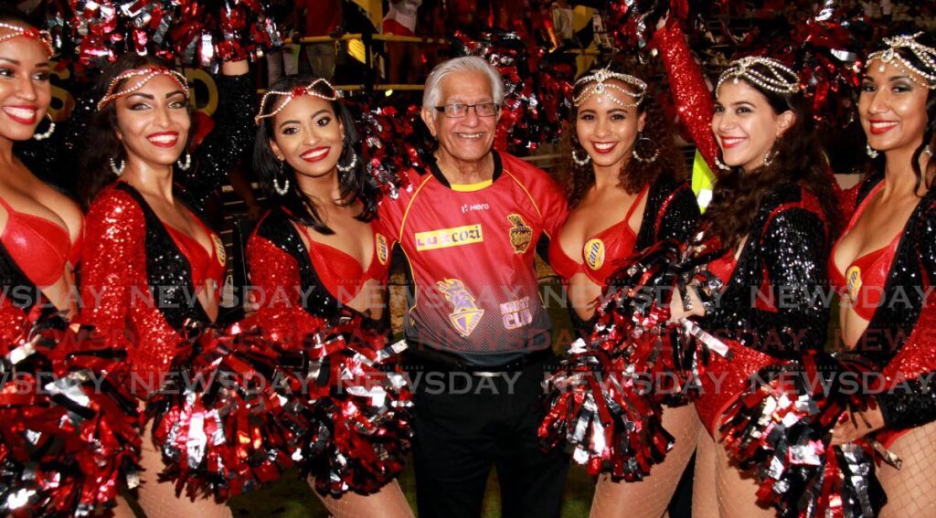 Former prime minister Basdeo Panday join cheerleaders to celebrate Trinbago Knight Riders's victory at the CPL 20/20 finals, Brian Lara Cricket Academy, Tarouba in 2017. Panday died on January 1 and his funeral was held on January 9. - 