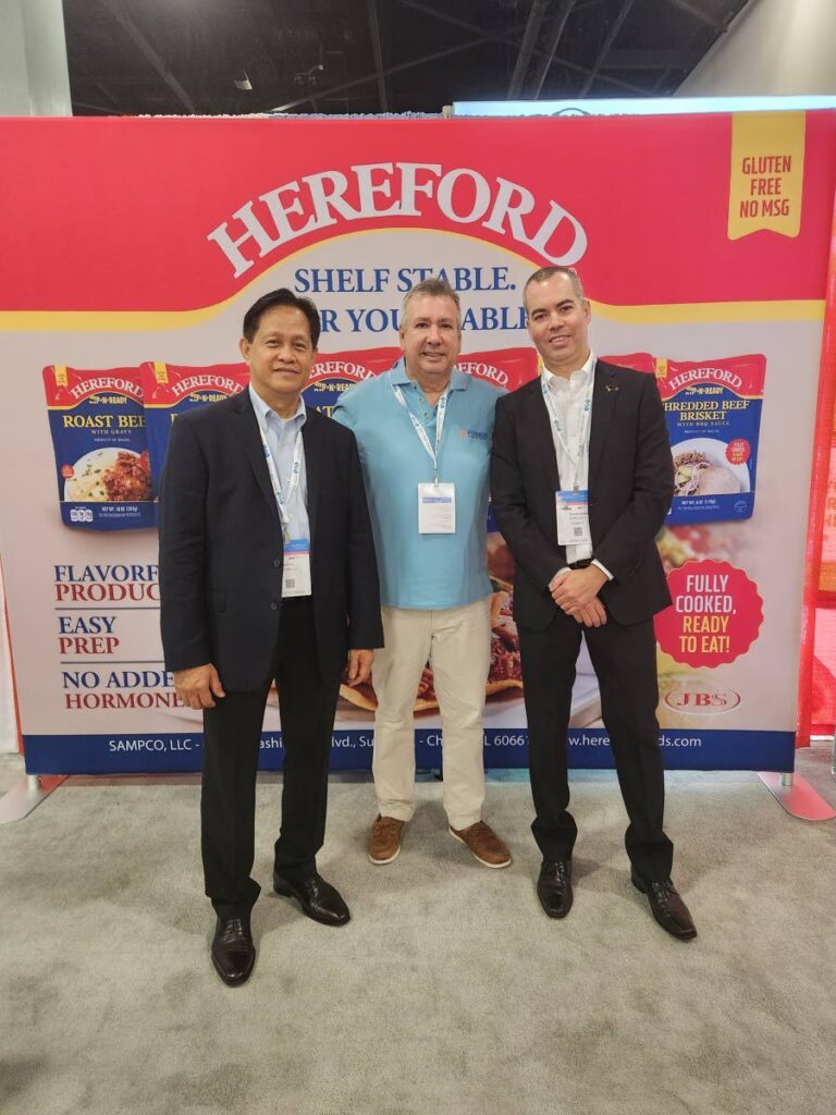 Sampco LLC, Teddy Yu, left; Furness Group executive chairman, Patrick Ferreira and Sampco LLC, Eduardo Padilha.
Photo courtesy Furness Ltd - 