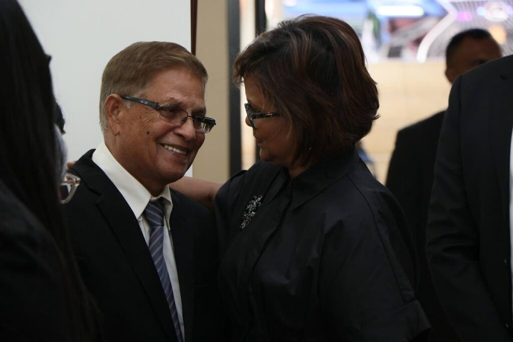 President Christine Kangaloo greets Subhas Panday, brother of former prime minister, the late Basdeo Panday, at the Rotunda, Red House, where Kangaloo signed a condolence book on Wednesday. - Photo courtesy Office of the Parliament