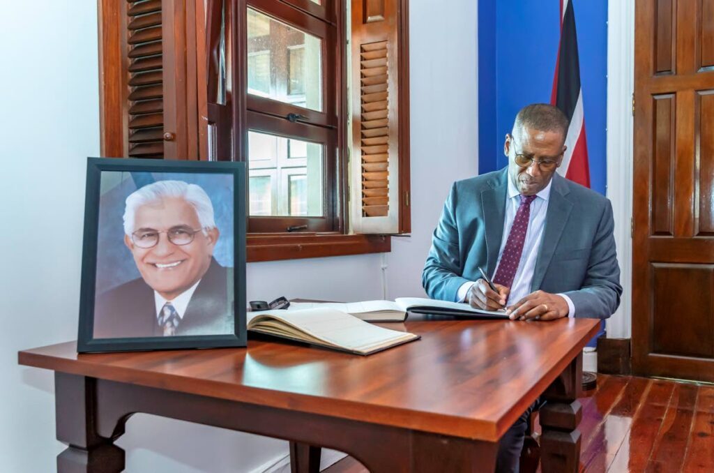 Chief Justice Ivor Archie signs the condolence book for former prime minister Basdeo Panday at the Assembly Legislature Building Scarborough, Tobago on January 4 - Photo courtesy THA