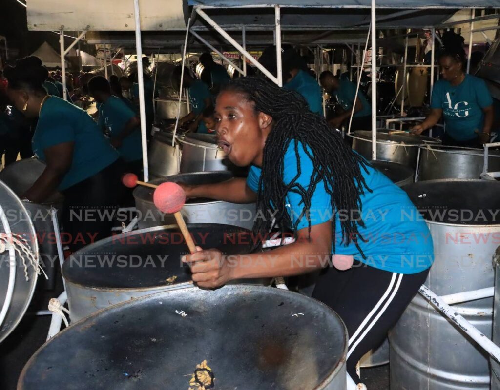 A member of Augmented Groove Steel Orchestra during the groups performance at the Panorama Small Conventional Band Semifinals at Victoria Square, Port of Spain, on Saturday. - Photo by Roger Jacob