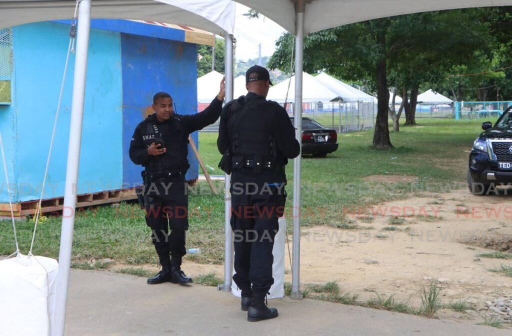 Private security officers seen at the Queen's Park Savannah earlier this week, days after a labourer who was constructing Carnival vendors' booths, was gunned down. FILE PHOTO - Angelo Marcelle