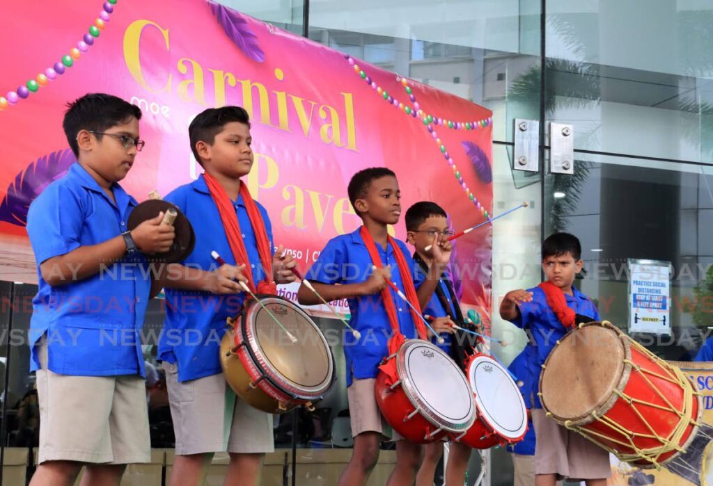 ROLL UP DE TASSA: Pupils of Avocat Vedic Primary School played provided tassa music at the Carnival on the Pavers concert on Friday. - Photo by Roger Jacob