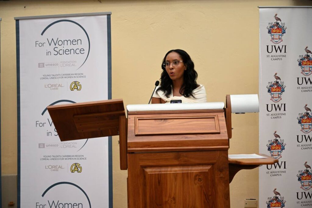 Sunshine De Caires, recipient of the L’Oreal-
UNESCO for Women in Science Award, speaking at the awards ceremony. - Photo courtesy UWI