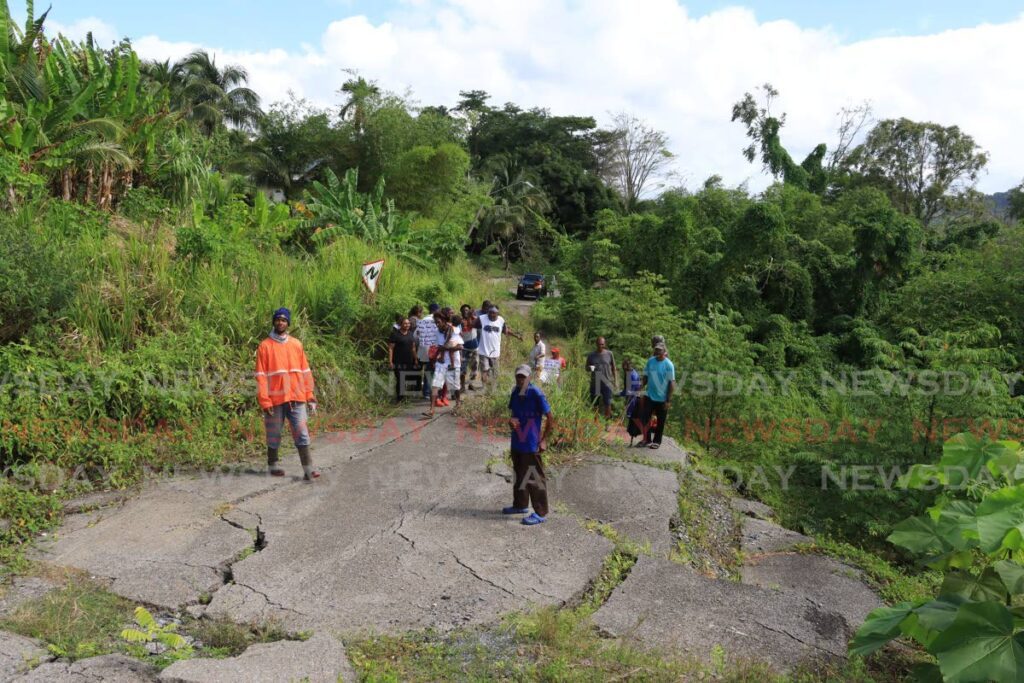 Pepper Village residents protested on Monday, calling on authorities to rebuild the collapsed Gran Couva Main Road after a WASA water main destroyed the road about two years ago.  - Roger Jacob