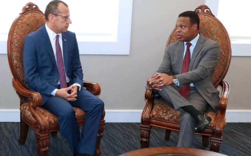 PAHO/WHO country representative Dr Gabriel Vivas Francesconi, left, speaks with Minister of Foreign and Caricom Affairs Dr Amery Browne, right, during his courtesy call to the ministry. - Photo courtesy the Ministry of Foreign and Caricom Affairs