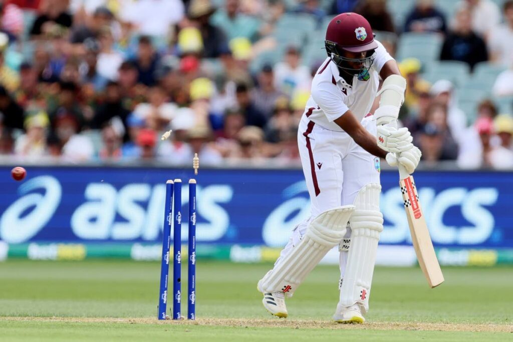 West Indies Kraigg Brathwaite is bowled by Australia’s Pat Cummins on the first day of the first Test in Adelaide, Australia, on January 17. - AP PHOTO