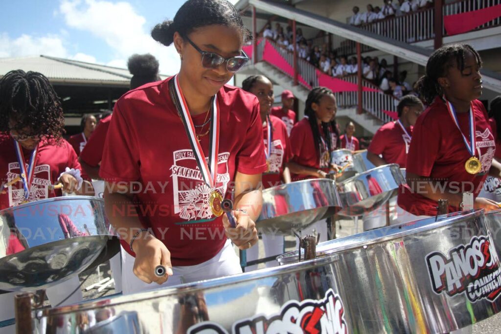 Captain Julianna Neilson of the Holy Faith Convent Penal steelband, winners of the Secondary schools Junior Panorama 2024 competition, during a celebration at the school on Wednesday.  - LINCOLN HOLDER 