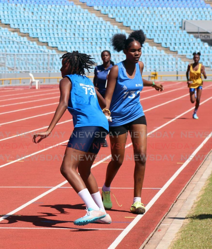 Holy Name Convent runners take part in the Trinidad and Tobago Secondary Schools' Relay Festival on January 18 at the Hasely Crawford Stadium, Port of Spain. - Photo by Sydney Joseph