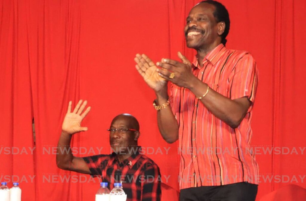 National Security Minister Fitzgerald Hinds (right) and Prime Minister Dr Keith Rowley at the PNM public meeting at the Croisee Promenade, San Juan on the night of Janaury 18.  - Photo by Roger Jacob 