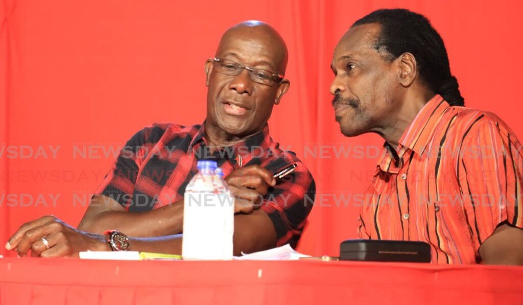 Prime Minister Dr Keith Rowley (left) and National Security Minister Fitzgerald Hinds (right) at the PNM public meeting held at the Croisee, San Juan on January 18. - Photo by Roger Jacob