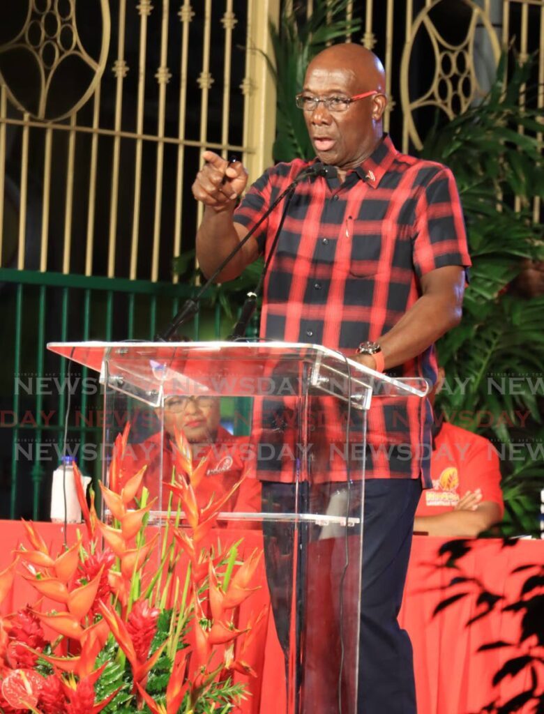 Prime Minister Dr Keith Rowley speaks to supporters at a PNM public meeting. - File photo by Roger Jacob