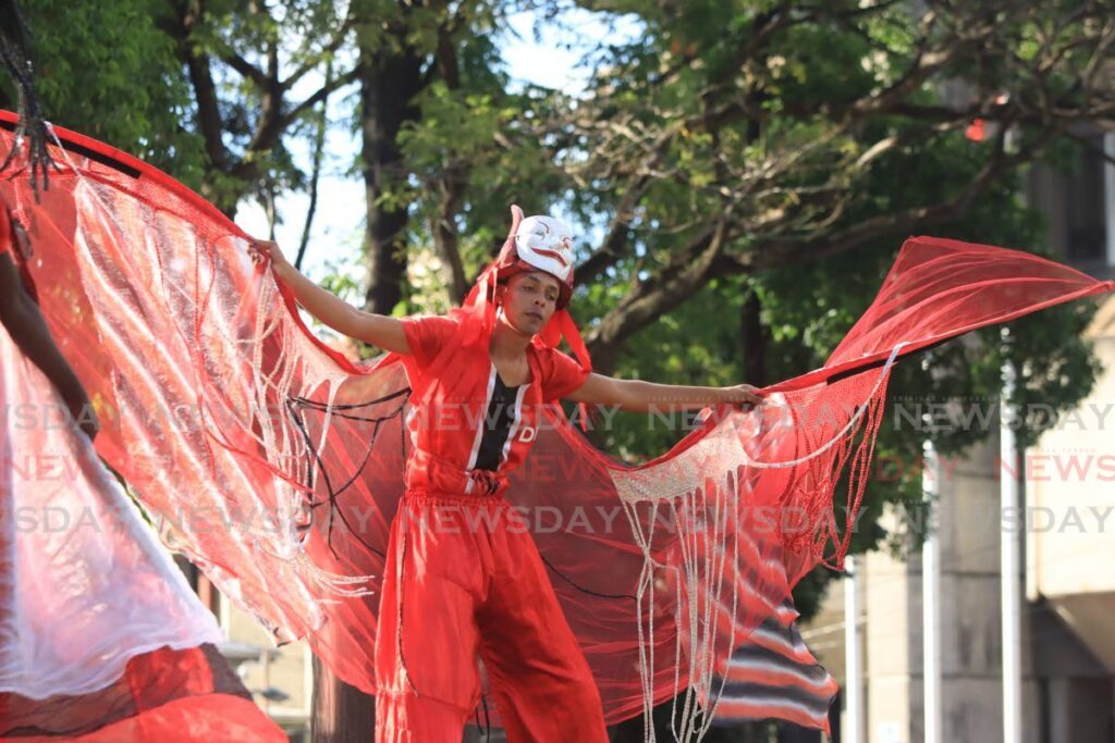 A moko jumbie dances at the launch of Downtown Carnival at Woodford Square, Port of Spain on January 19, 2024. - Photo by Faith Ayoung