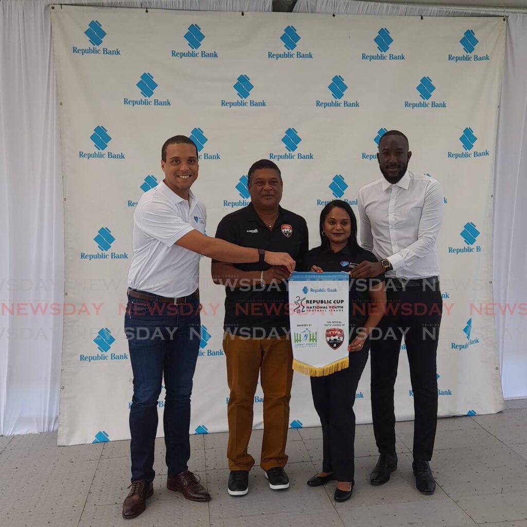 From L-R: JP Clarke, RBL's wealth management general manger, TTFA technical dierctor Anton Corneal, RBL's group brand manager Reena Gopaul and Gateway Athletics managing director Shem Alexander.  - Photo by Roneil Walcott