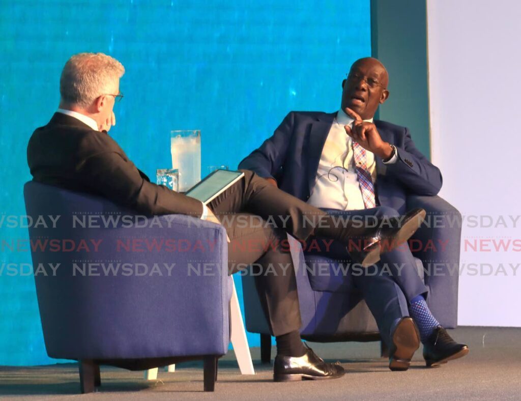 Prime Minister Dr Keith Rowley, right, speaks with Dr Thackwray Driver, president and CEO of Energy Chamber TT at the Energy Conference 2024 on Monday at the Hyatt Regency, Port of Spain. - ROGER JACOB