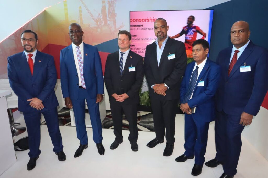 ENERGY CONFERENCE 2024: Energy Minister Stuart Young, left, PM Keith Rowley, Heritage Petroleum executives Erik keskula, Michael Quamina, Reynold Ajodhasingh and ECTT chairman Jerome Dookie ECTT, pose for a picture on Monday at the Hyatt Regency, Port of Spain. - Photo by Roger Jacob