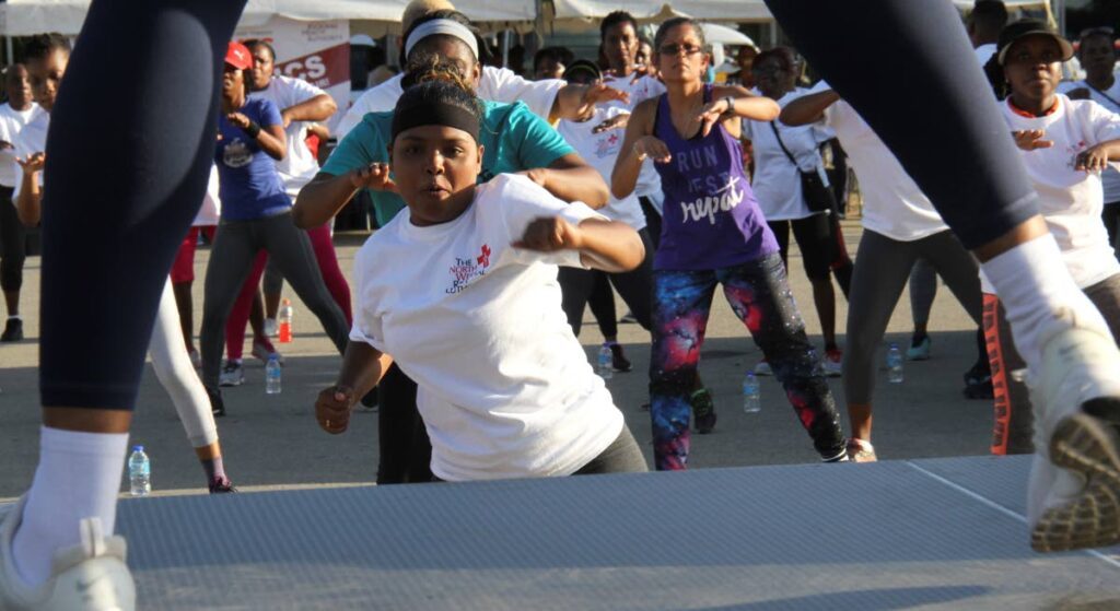 People take part in an aerobics burn out hosted by the North West Regional Health Authority at the Queen’s Park Savannah, Port of Spain. - File photo by Angelo Marcelle