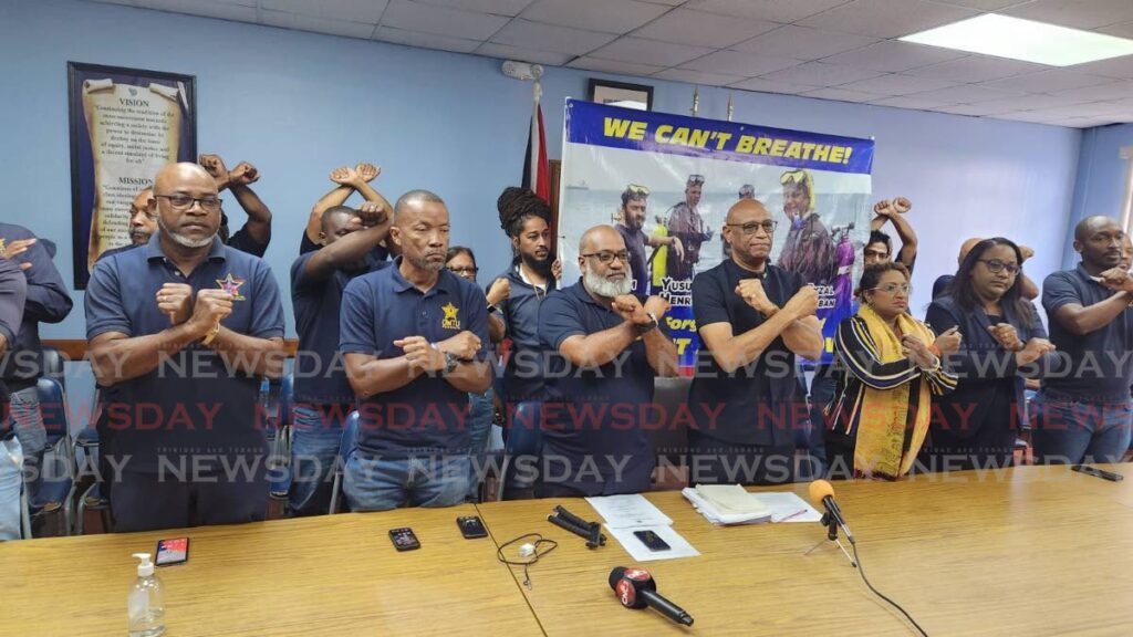 ANGRY: Members of the OWTU display their displeasure during a press conference on Monday in San Fernando where they demanded action after the Paria drowning report was laid in Parliament last week. - Photo by Yvonne Webb