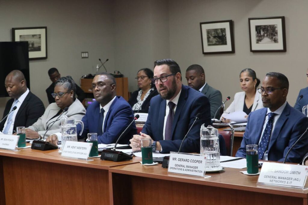 COMMUNICATING: TSTT's Ag CEO Kent Western, front row 2nd from right, makes a point before the Joint Select Committee (JSC) of Parliament which met on February 22 to discuss the TSTT cyber attack. - Photo courtesy Office of the Parliament