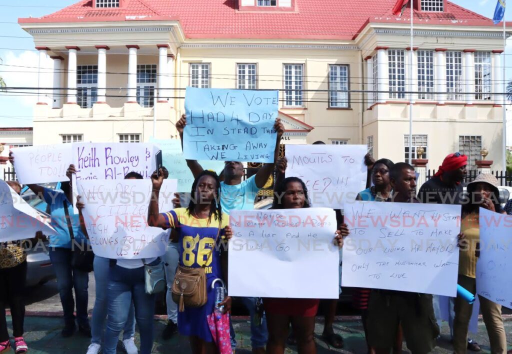 San Fernando vendors protest outside City Hall, Harris Promenade against the decision made by San Fernando Mayor Robert Parris to have them stop vending on High Street, San Fernando. - File photo by Ayanna Kinsale