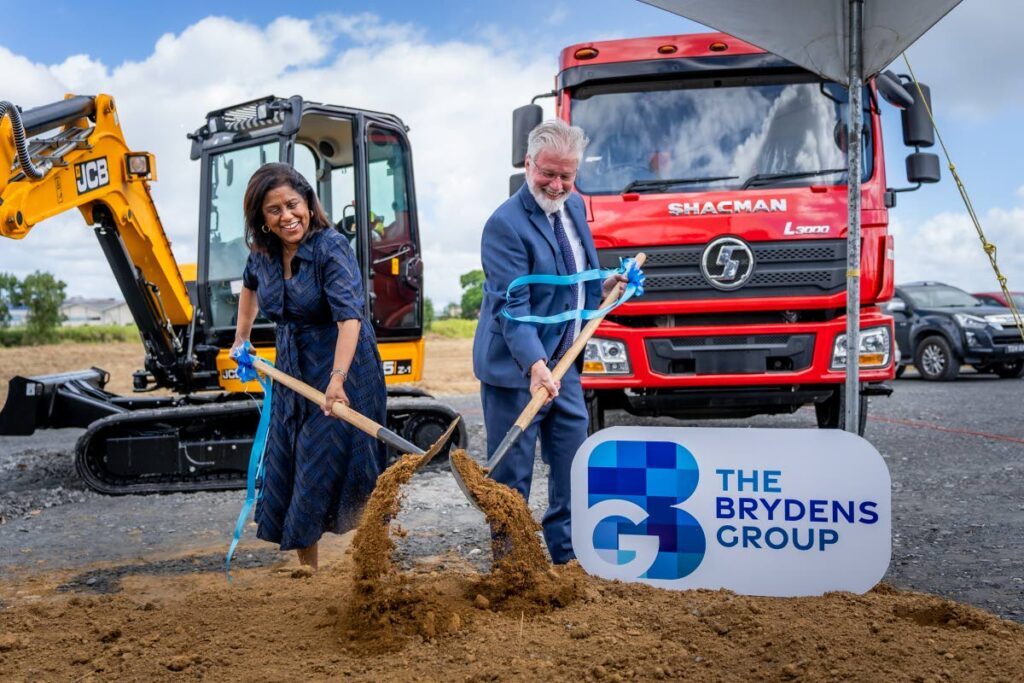 SOD TURNING: Trade Minister Paula Gopee-Scoon, left, and Brydens Group Deputy Chairman Michael Conyers, at the site of the $200 million Regional Distribution Centre. - Photo courtesy Brydens Group