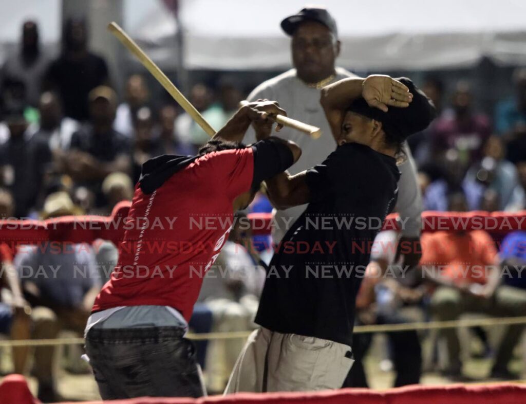 Two contestants engage in battle during the preliminary rounds.  - Photo by Angelo Marcelle
