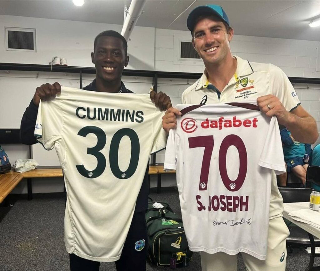West Indies pacer Shamar Joseph, left, and Australia captain Pat Cummins swapped jerseys on Sunday after the 2nd Test in Brisbane. - 
