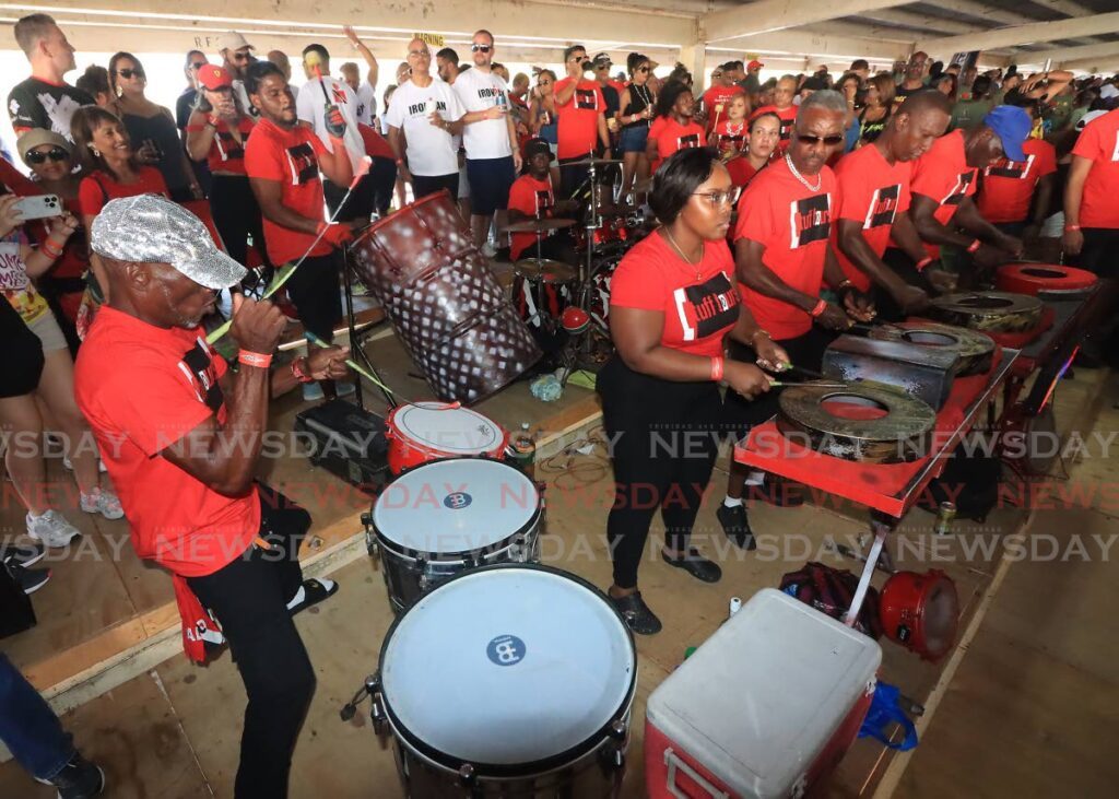 NORTH STAND ACTION: Tuff Tours rhythm section kept patrons at Pan Trinbago's Savannah Party for Panorama semifinals busy in the north stand at Carnival City, Queen's Park Savannah.