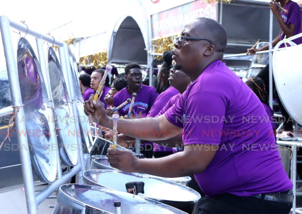 Members of Katzenjammers Steel Orchestra enjoy themselves while playing Dennis 